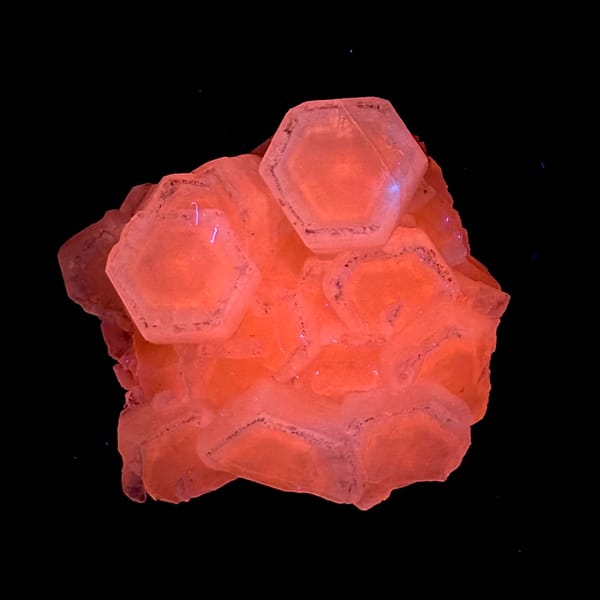 Flat hexagonal coin calcite crystals from Fujian — detail view