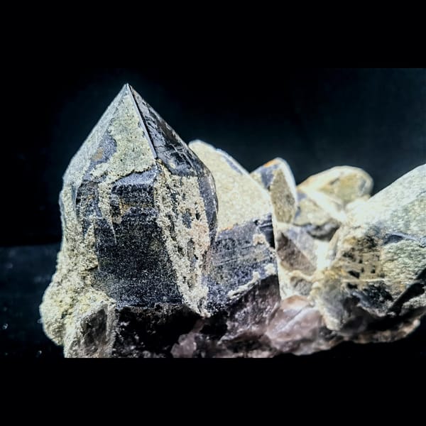 Smoky quartz cluster with epidote and feldspar from Shandong — alternate view