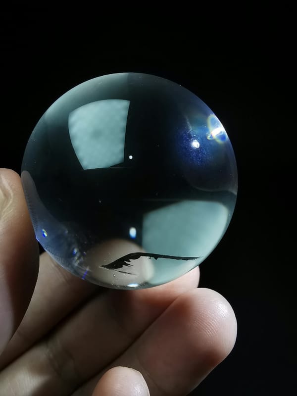 Clear Quartz Sphere with Blade-Like Veil — complete mineral specimen view 2