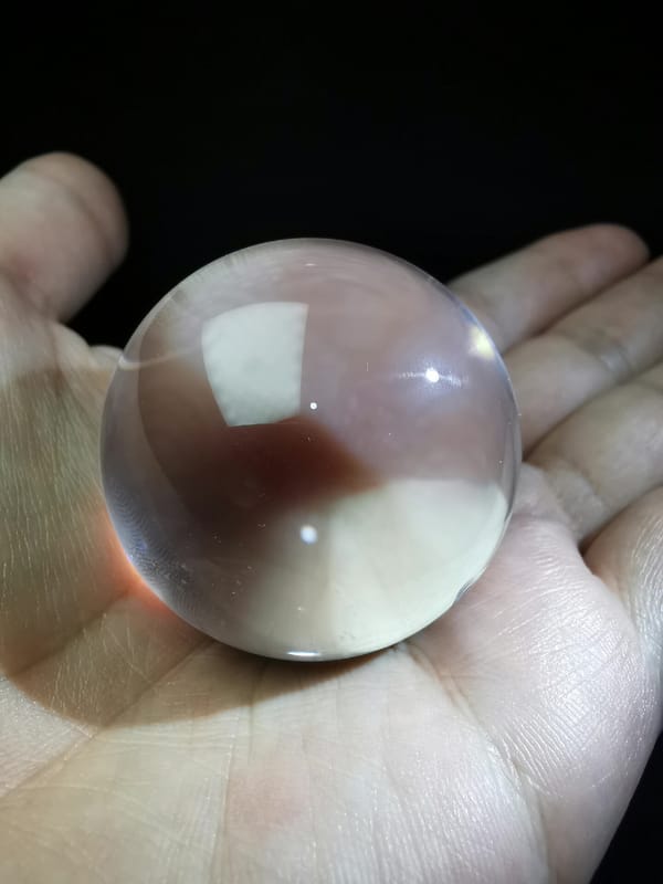 Clear Quartz Sphere with Blade-Like Veil — complete mineral specimen view 5