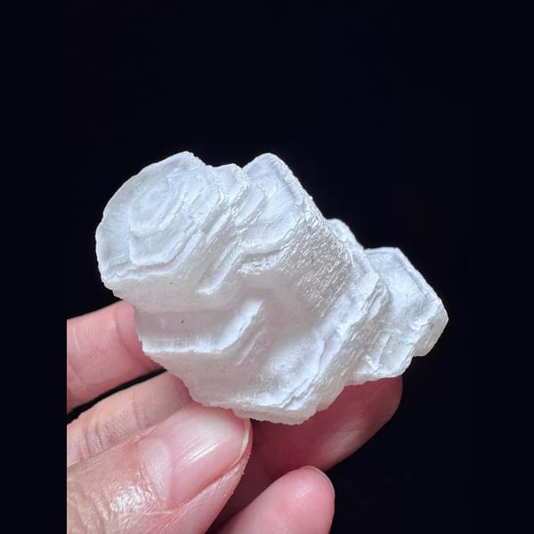 Pink stacked coin calcite from Fujian — complete view
