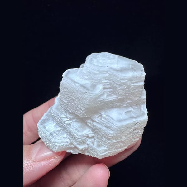 Pink stacked coin calcite from Fujian — alternate view