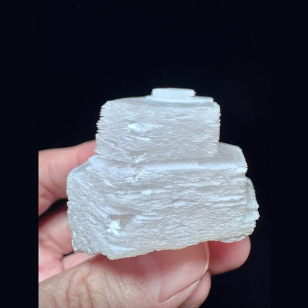 Pink stacked coin calcite from Fujian — alternate view