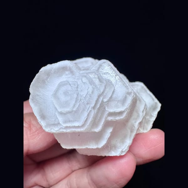 Pink stacked coin calcite from Fujian — detail view