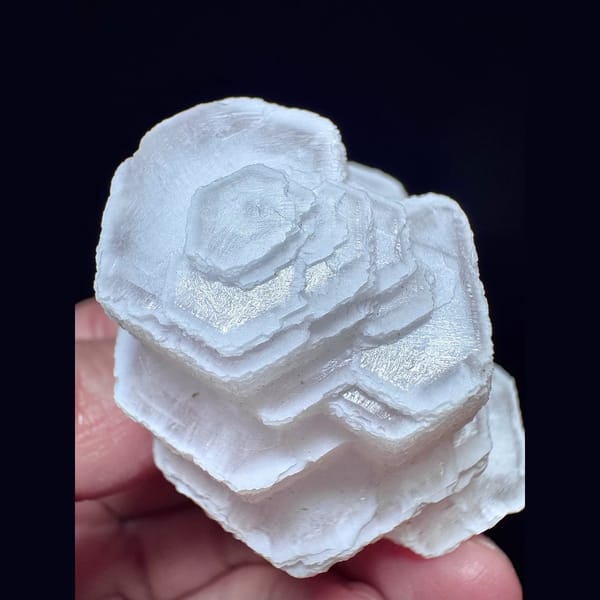 Pink stacked coin calcite from Fujian — detail view
