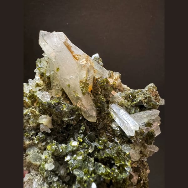Epidote with double-terminated quartz from Sichuan — detail view