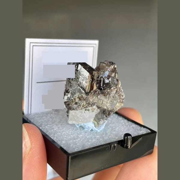 Lustrous brown axinite with quartz from Pakistan — alternate view