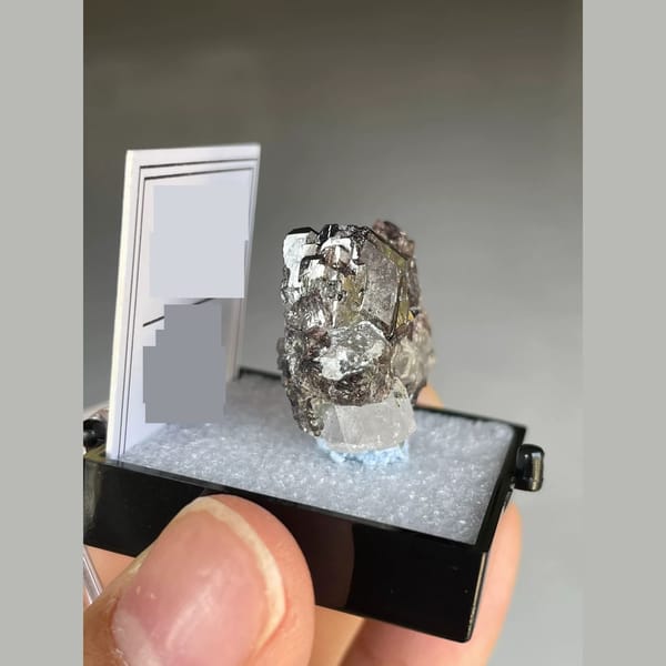 Lustrous brown axinite with quartz from Pakistan — detail view