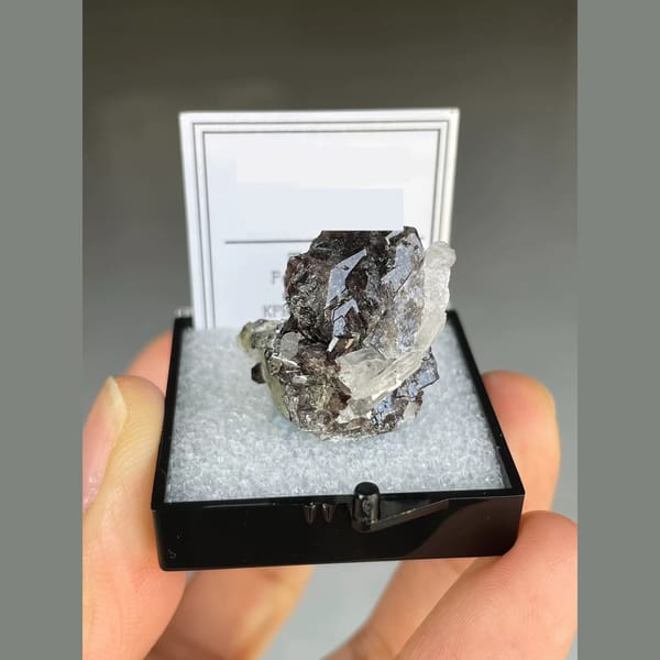 Lustrous brown axinite with quartz from Pakistan — alternate view