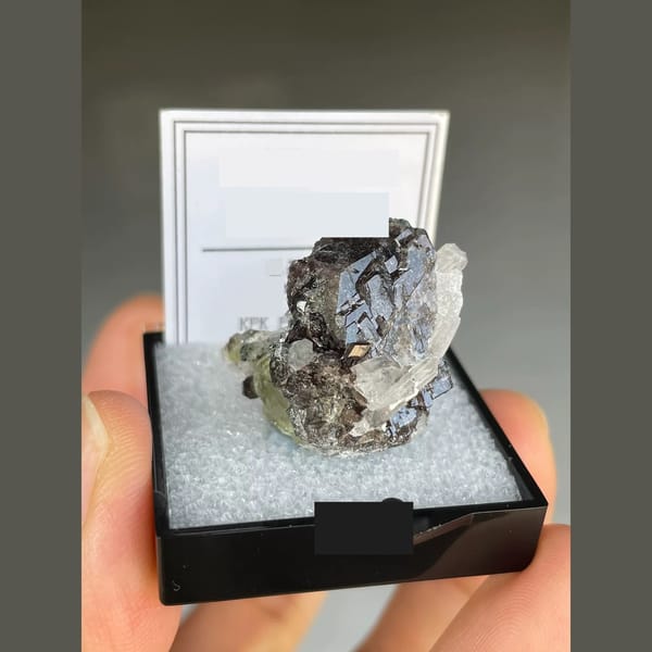 Lustrous brown axinite with quartz from Pakistan — detail view