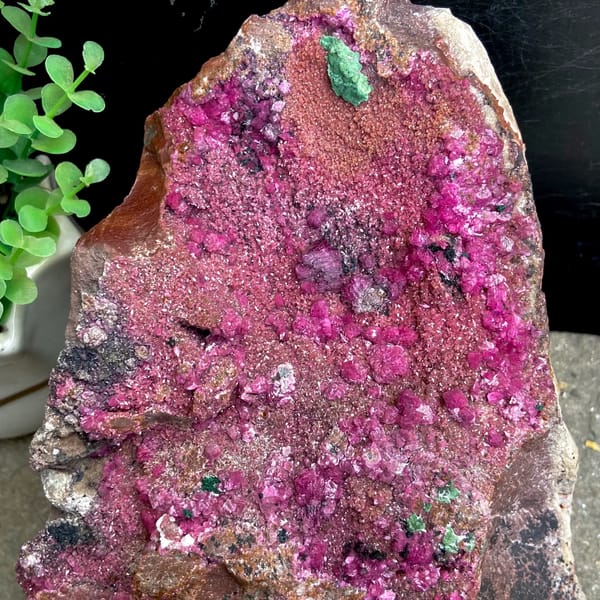 Large magenta cobaltoan calcite with malachite — alternate view