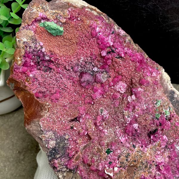 Large magenta cobaltoan calcite with malachite — alternate view