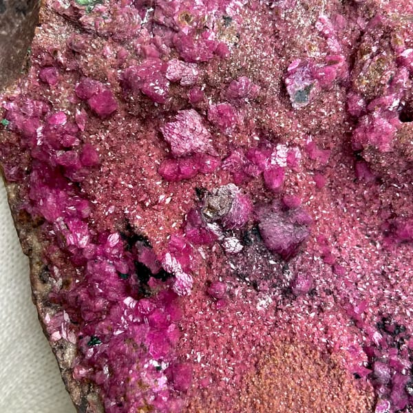 Large magenta cobaltoan calcite with malachite — detail view