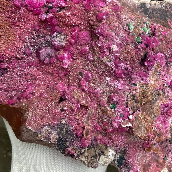 Large magenta cobaltoan calcite with malachite — detail view