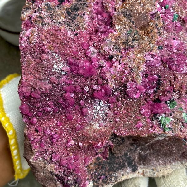 Large magenta cobaltoan calcite with malachite — detail view
