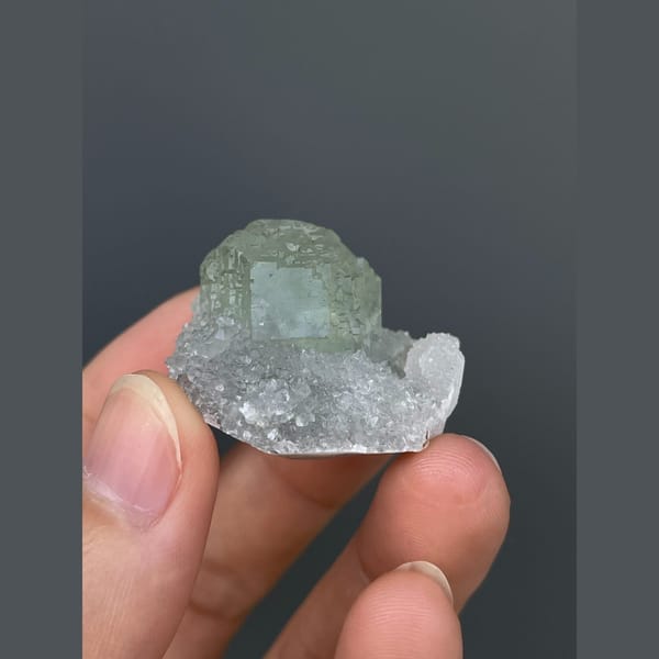Pale mint green fluorite with quartz from Fujian — complete view