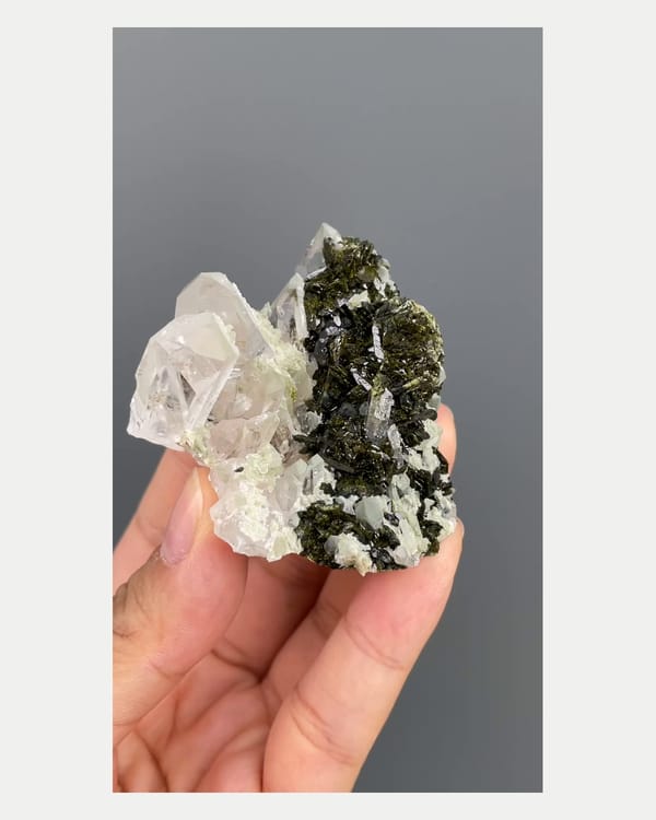 Complete front view of epidote with quartz crystals