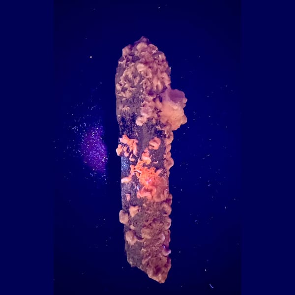 Quartz with pink petal calcite and specular hematite from Inner Mongolia — detail view