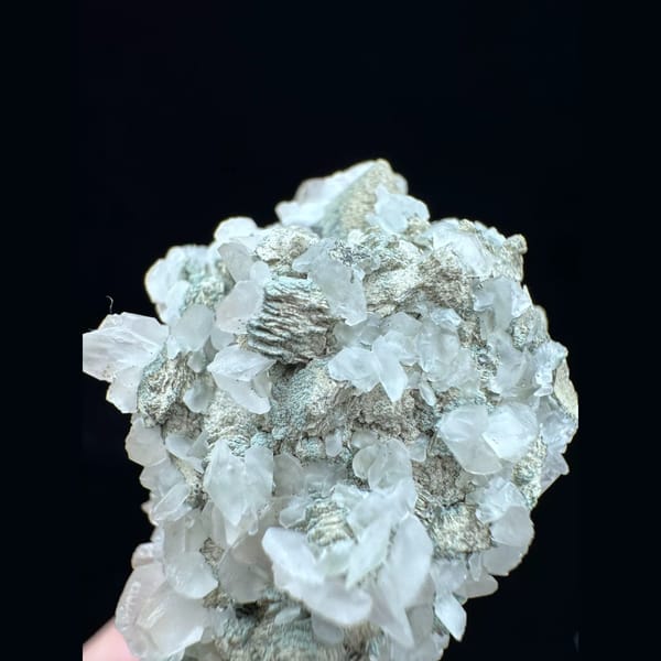 Quartz floater with butterfly calcite from Inner Mongolia — complete view