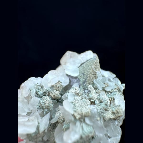 Quartz floater with butterfly calcite from Inner Mongolia — alternate view