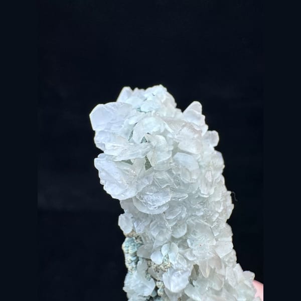 Quartz floater with butterfly calcite from Inner Mongolia — detail view