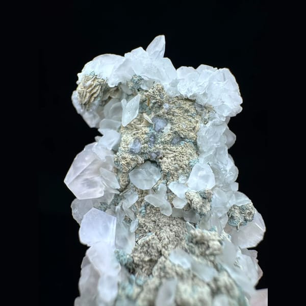 Quartz floater with butterfly calcite from Inner Mongolia — detail view