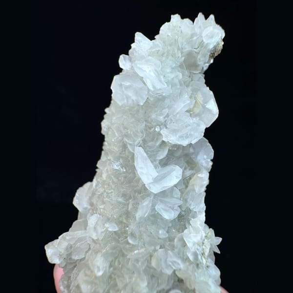 Quartz floater with butterfly calcite from Inner Mongolia — detail view