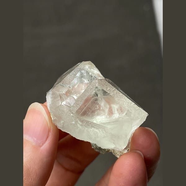 Transparent pale green fluorite from Xianghualing, Hunan — complete view