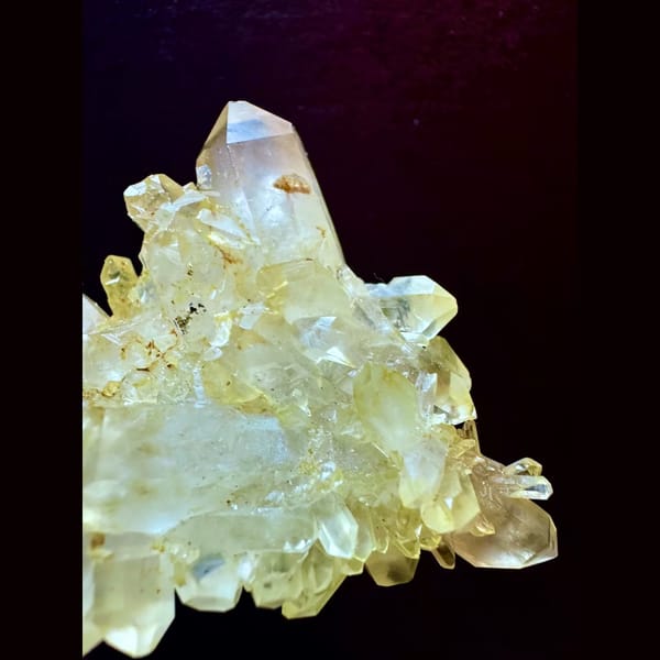 Double-terminated yellow quartz cluster from Brazil — detail view
