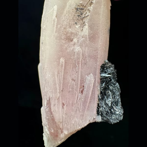 Pink quartz with specular hematite rosette from Inner Mongolia — detail view