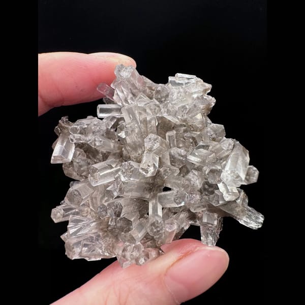 Clear calcite floater cluster from Fujian — alternate view