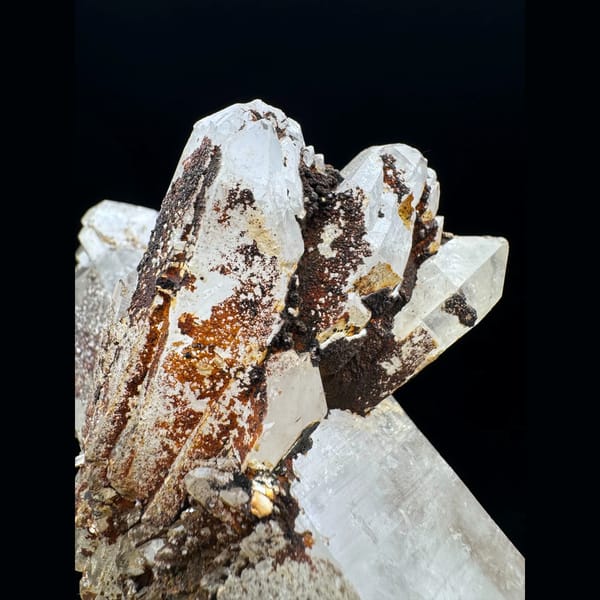 Large Himalayan quartz floater from Tibet on a wood stand — detail view