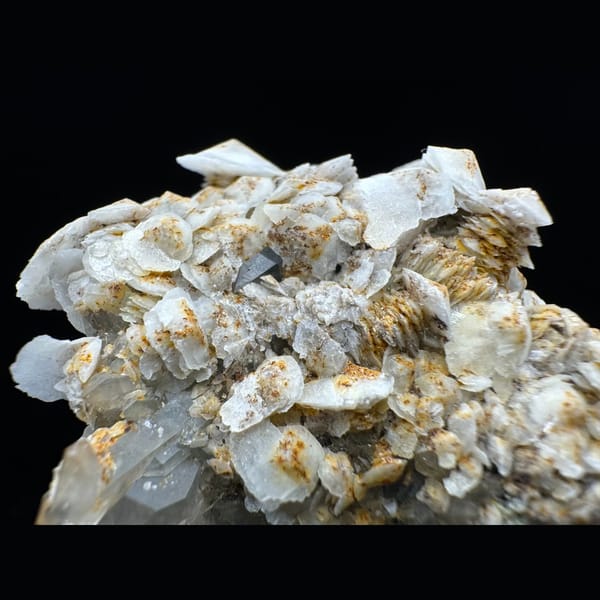 Quartz cluster with layered petal calcite from Inner Mongolia — detail view