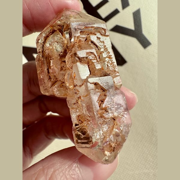 Red mud skeletal double-terminated quartz from Madagascar — alternate view