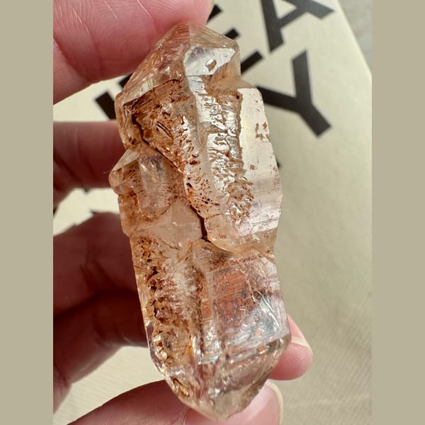 Red mud skeletal double-terminated quartz from Madagascar — detail view