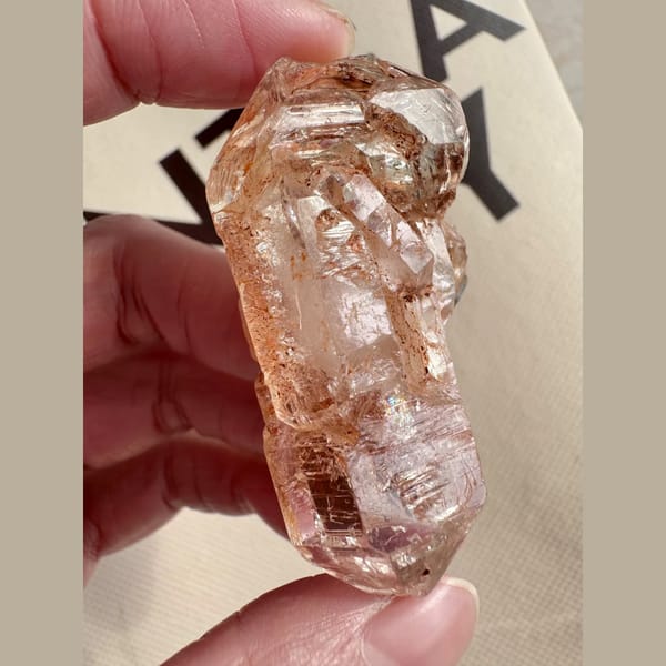 Red mud skeletal double-terminated quartz from Madagascar — detail view