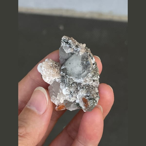 Clear quartz with bladed calcite from Fujian — detail view