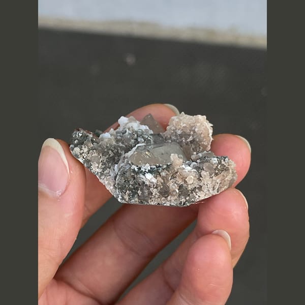 Clear quartz with bladed calcite from Fujian — detail view