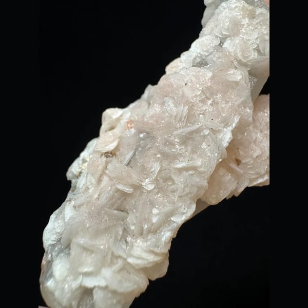 Quartz floater with pink petal calcite from Inner Mongolia — detail view