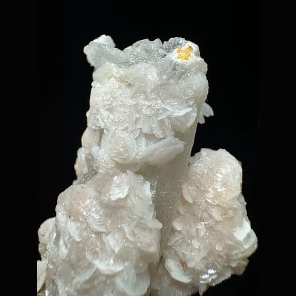 Quartz floater with pink petal calcite from Inner Mongolia — detail view