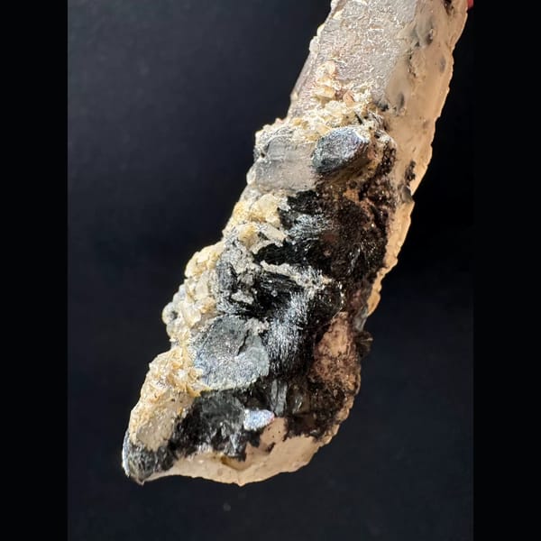 Quartz floater with specular hematite from Inner Mongolia — detail view