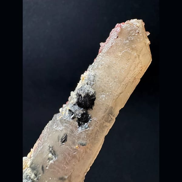 Quartz floater with specular hematite from Inner Mongolia — detail view