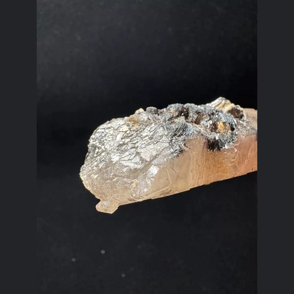 Quartz floater with specular hematite from Inner Mongolia — detail view