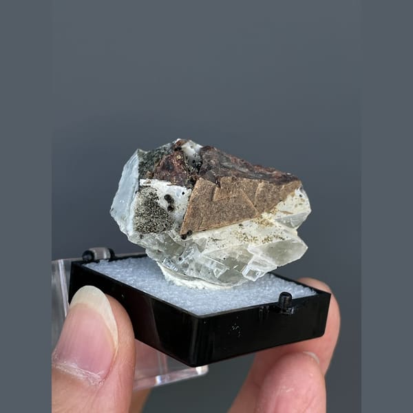 Brown helvite crystals on white calcite from Inner Mongolia — alternate view