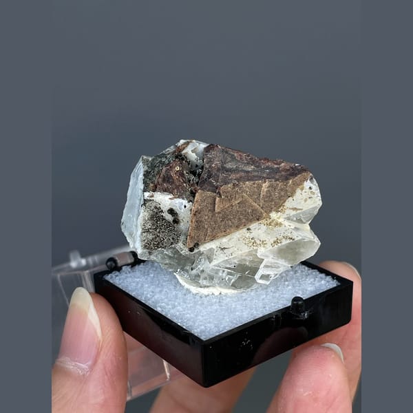 Brown helvite crystals on white calcite from Inner Mongolia — detail view