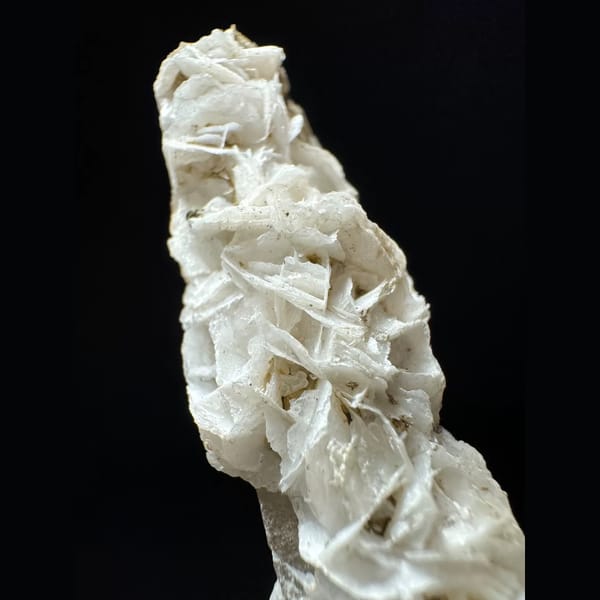 Slender quartz floater with white petal calcite from Inner Mongolia — alternate view