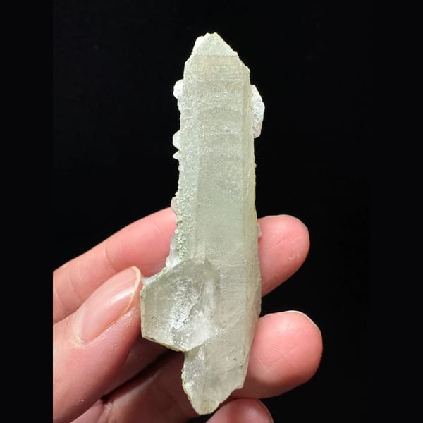 Small quartz floater with white petal calcite from Inner Mongolia — detail view