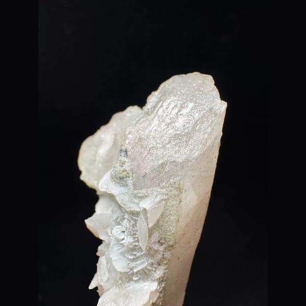 Small quartz floater with white petal calcite from Inner Mongolia — detail view