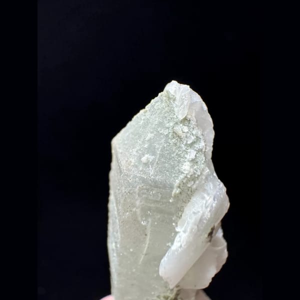 Small quartz floater with white petal calcite from Inner Mongolia — detail view