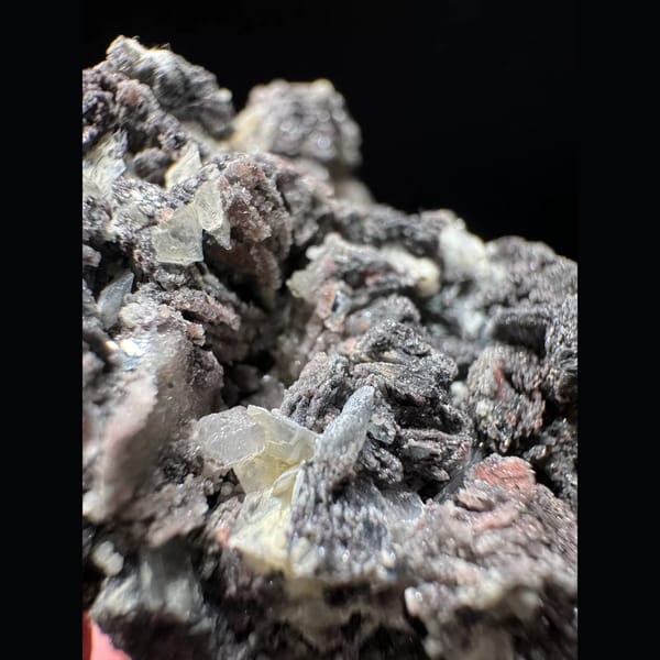 Petal calcite with specular hematite from Inner Mongolia — detail view